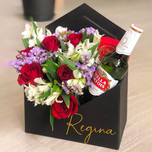 Letter-box com flores da estação, chocolate Lindt e Cerveja Stella Artois